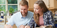 Man Helping Teenager With Homework Gettyimages 655371764 300X200