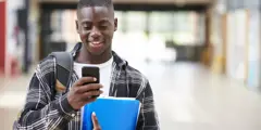 Gettyimages 878918894 Student On Mobile