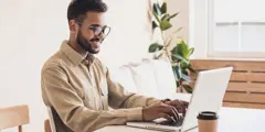 Gettyimages 1139425869 Man At Computer